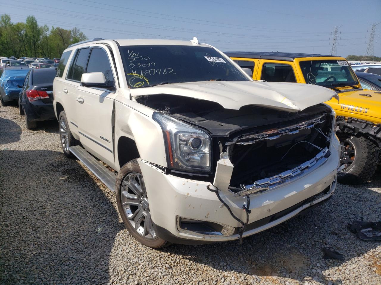 GMC YUKON DENA 2015 with VIN 1GKS1CKJ0FR697482 - Photo from auction