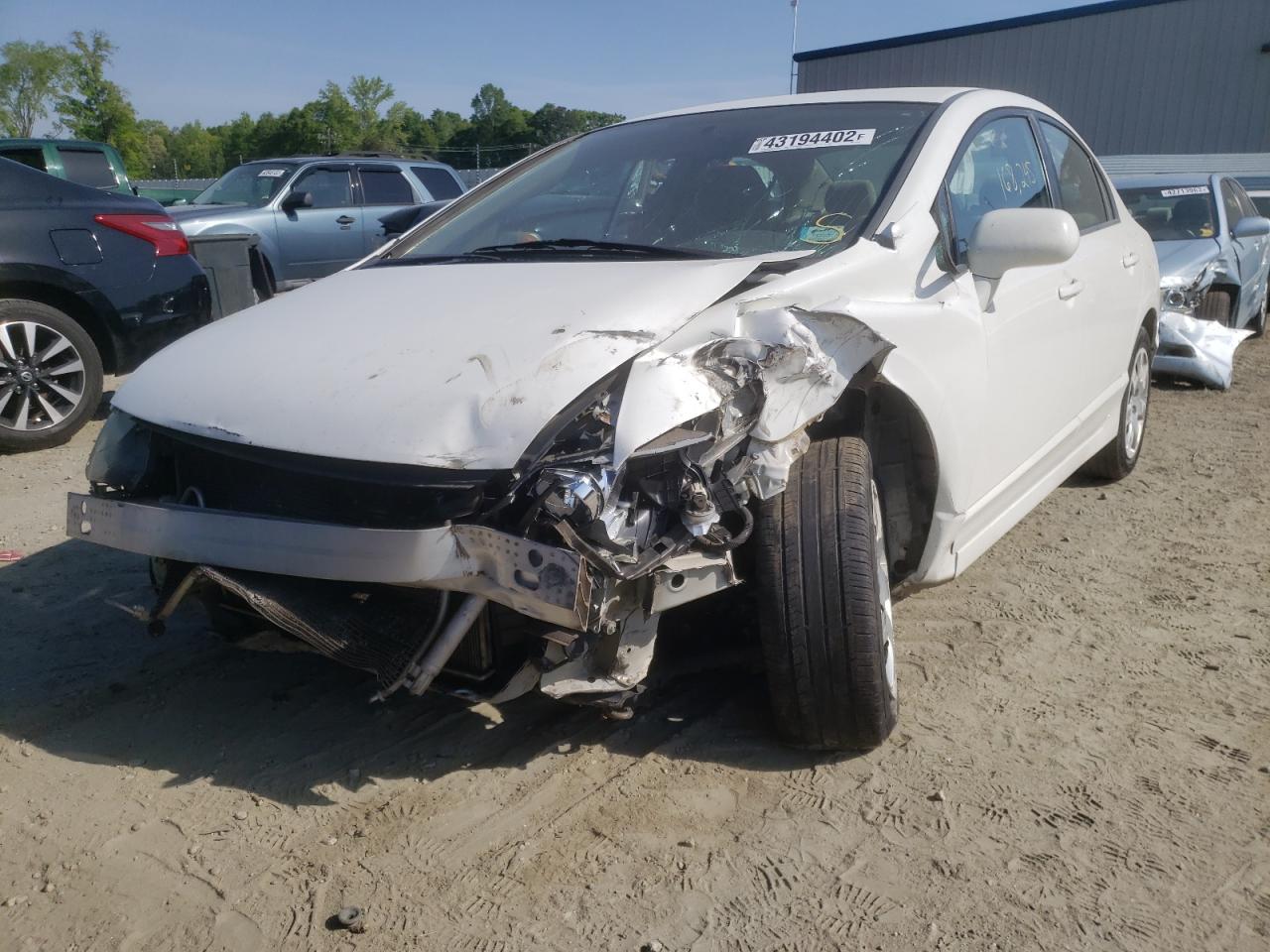 Photo 2 from auction – 2010 HONDA CIVIC LX with VIN 2HGFA1F58AH572464