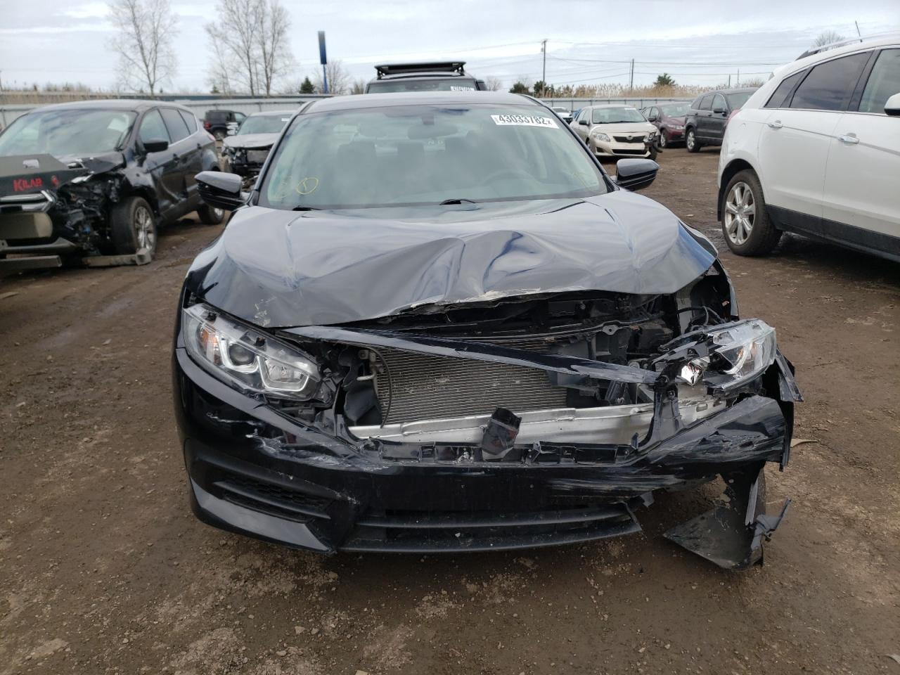 Photo 9 from auction – 2017 HONDA CIVIC LX with VIN 19XFC2F57HE049702