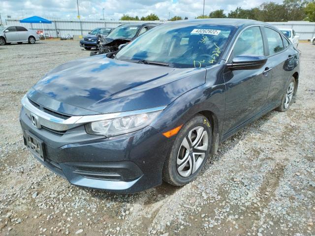 Photo 2 from auction – 2017 HONDA CIVIC LX with VIN 2HGFC2F5XHH523471