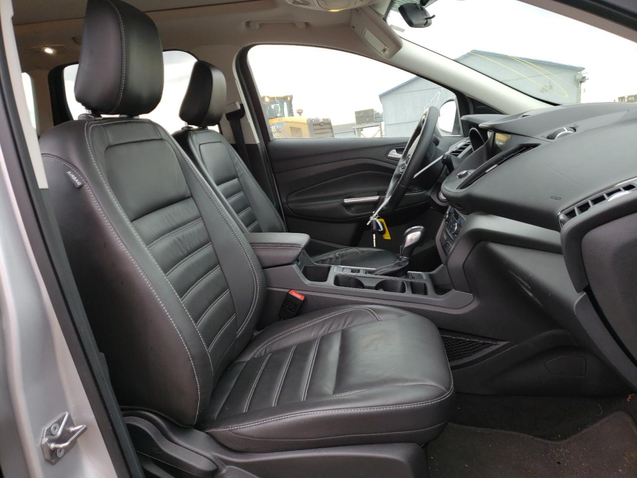Photo 5 from auction – 2018 FORD ESCAPE SEL with VIN 1FMCU9HD5JUA30257