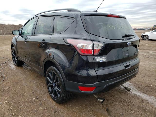 Photo 3 from auction – 2017 FORD ESCAPE SE with VIN 1FMCU9GD5HUD84081