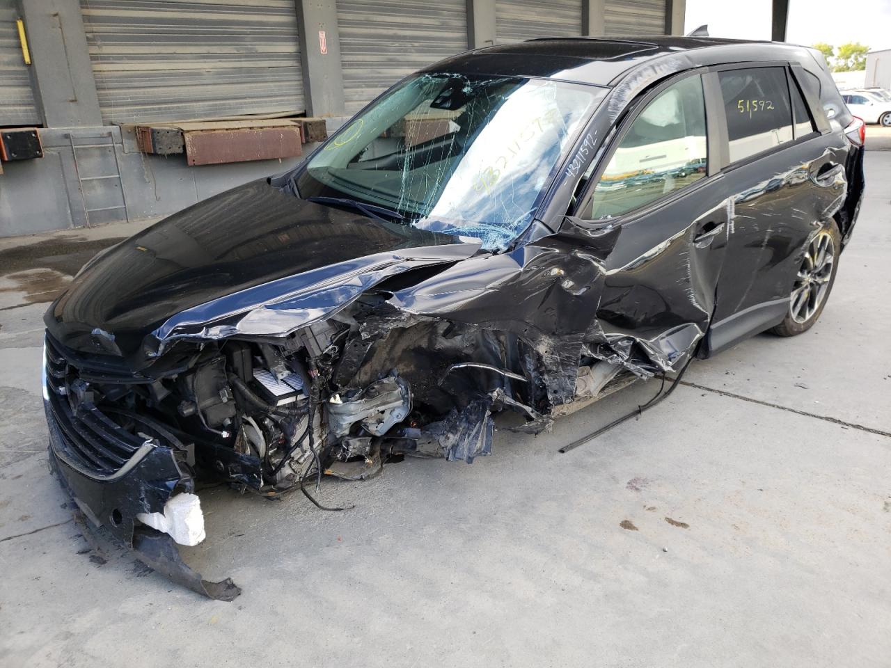 Photo 9 from auction – 2016 MAZDA CX-5 GT with VIN JM3KE2DY4G0806270