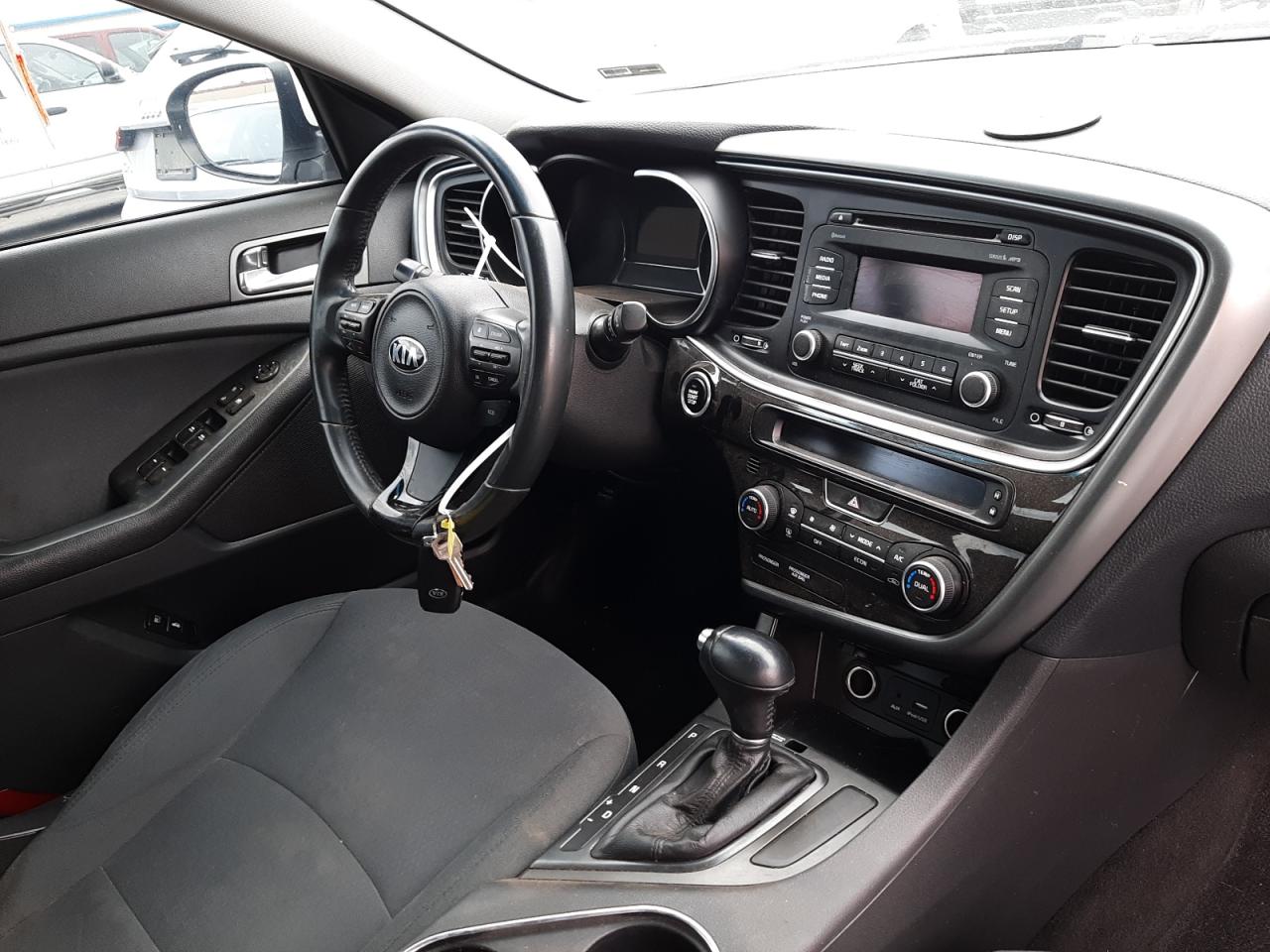Photo 9 from auction – 2016 KIA OPTIMA HYB with VIN KNAGM4AD9G5099603
