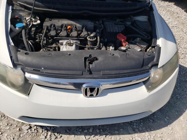 Photo 7 from auction – 2006 HONDA CIVIC LX with VIN JHMFA165X6S003399