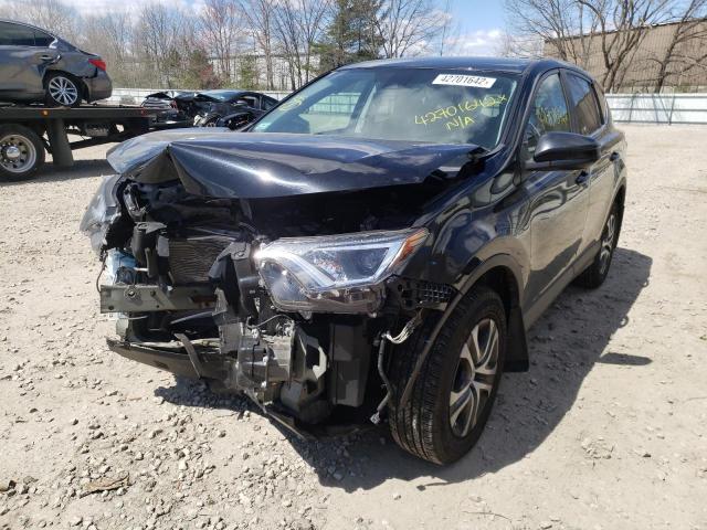 Photo 2 from auction – 2018 TOYOTA RAV4 LE with VIN 2T3BFREV3JW751817