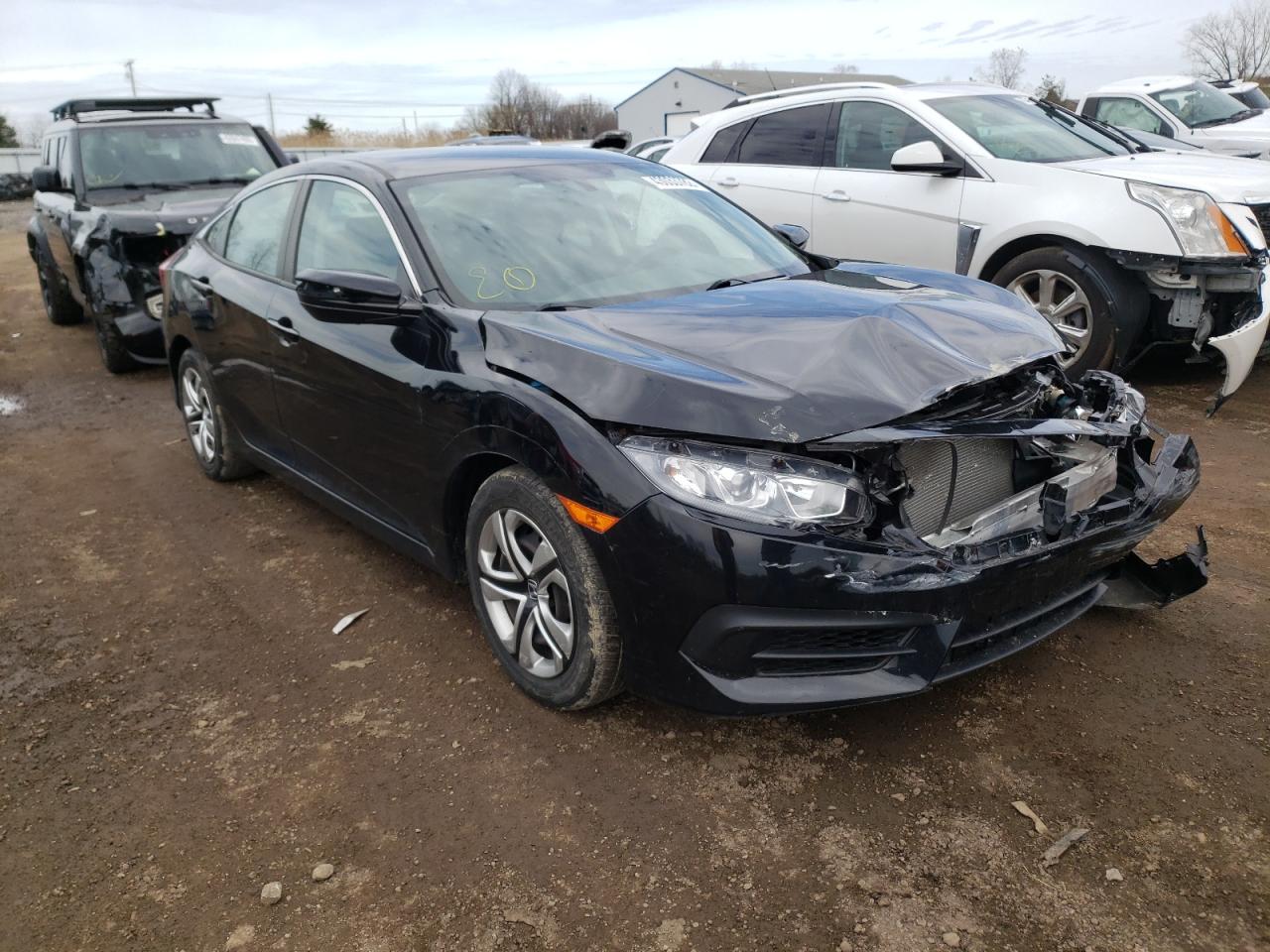 HONDA CIVIC LX 2017 with VIN 19XFC2F57HE049702 - Photo from auction