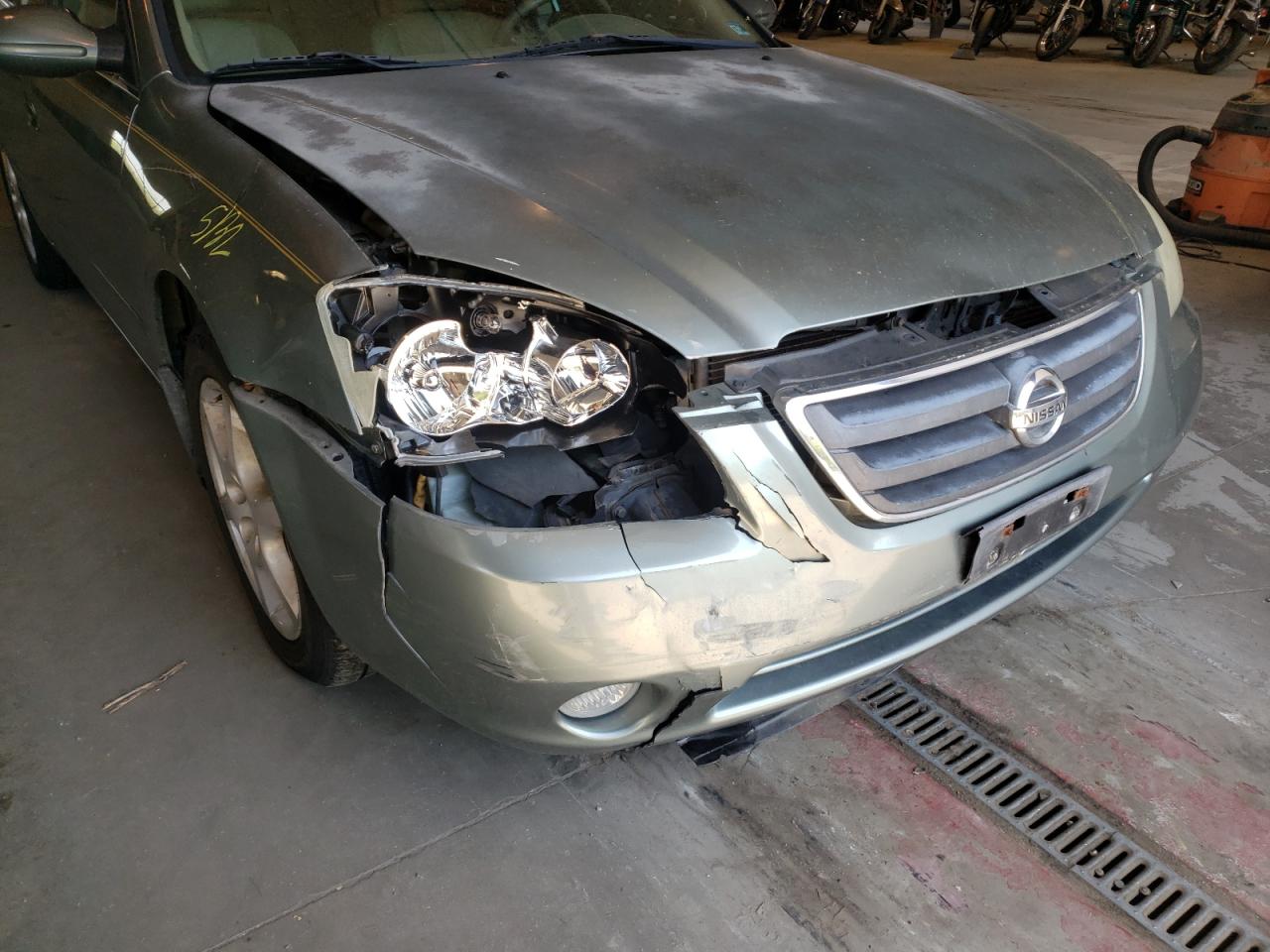Photo 9 from auction – 2004 NISSAN ALTIMA SE with VIN 1N4BL11E84C120803