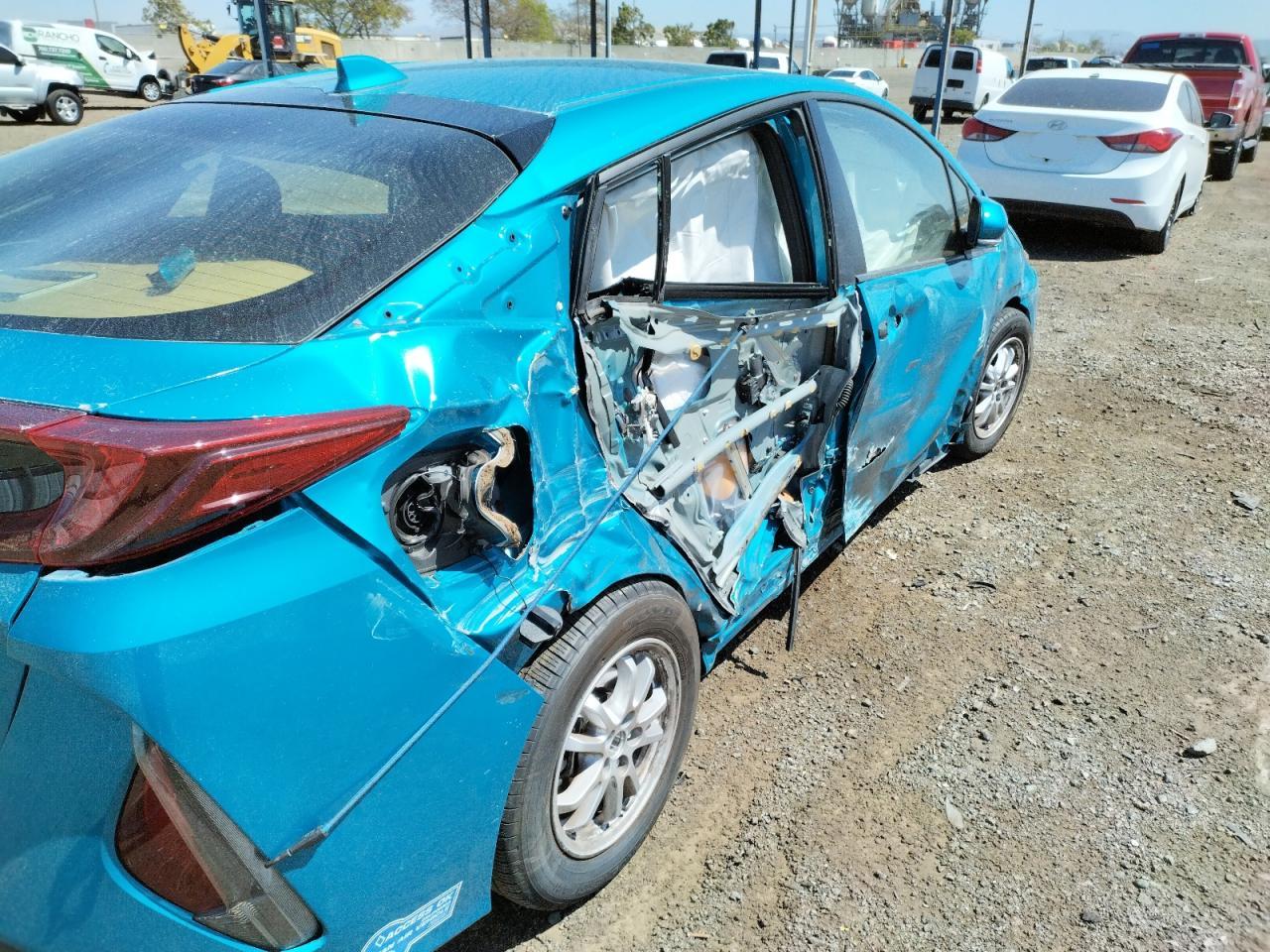 Photo 9 from auction – 2021 TOYOTA PRIUS PRIM with VIN JTDKAMFP3M3173338