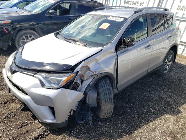 Photo 2 from auction – 2018 TOYOTA RAV4 LE with VIN 2T3BFREV6JW767834