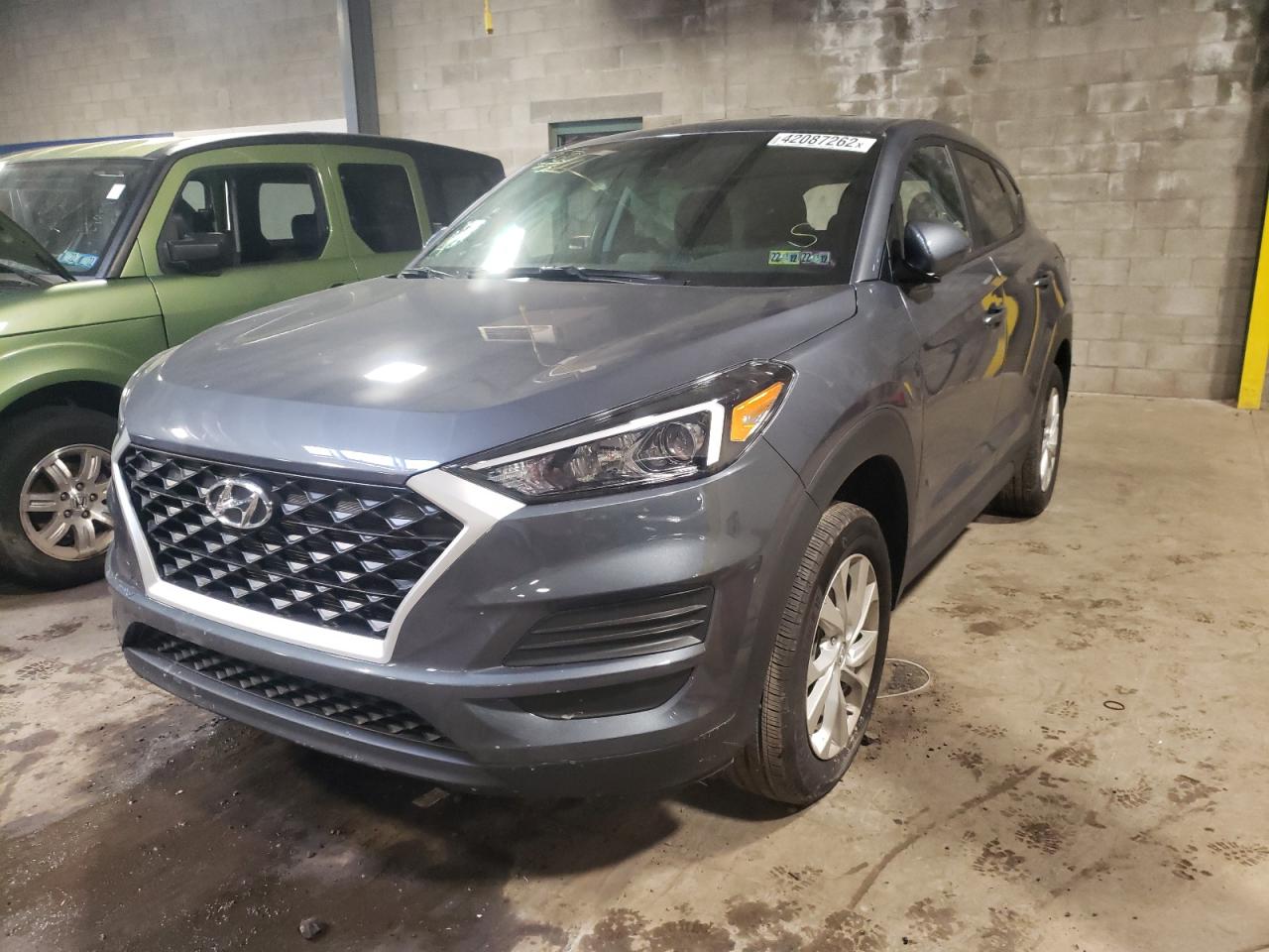 Photo 2 from auction – 2021 HYUNDAI TUCSON SE with VIN KM8J2CA40MU374975