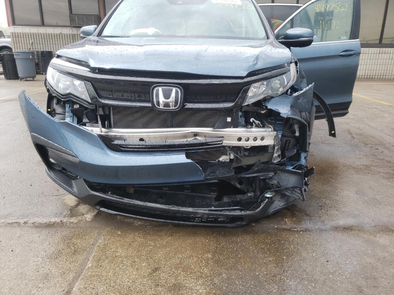 Photo 9 from auction – 2021 HONDA PILOT SE with VIN 5FNYF6H22MB059309