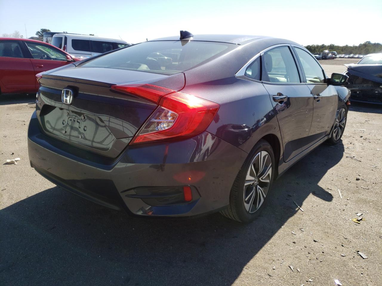 Photo 4 from auction – 2018 HONDA CIVIC EX with VIN JHMFC1F35JX032412
