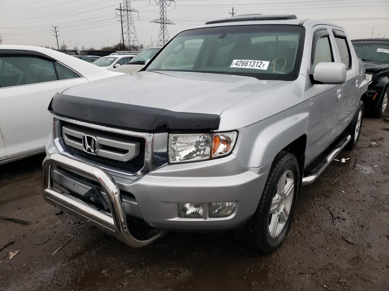 Photo 2 from auction – 2010 HONDA RIDGELINE with VIN 5FPYK1F5XAB007988