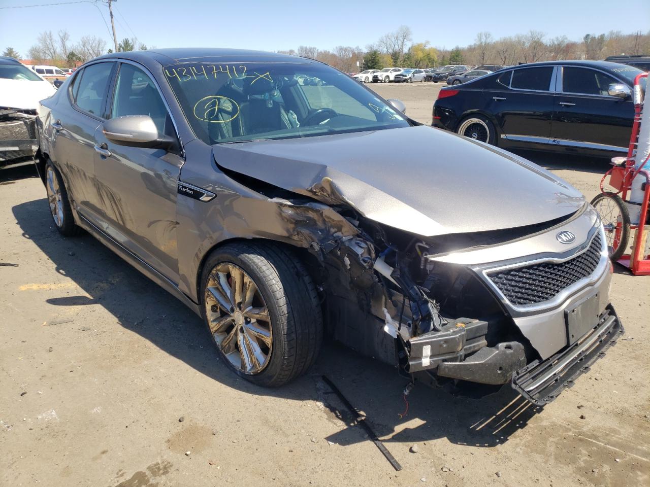 KIA OPTIMA SX 2015 with VIN 5XXGR4A65FG382290 - Photo from auction