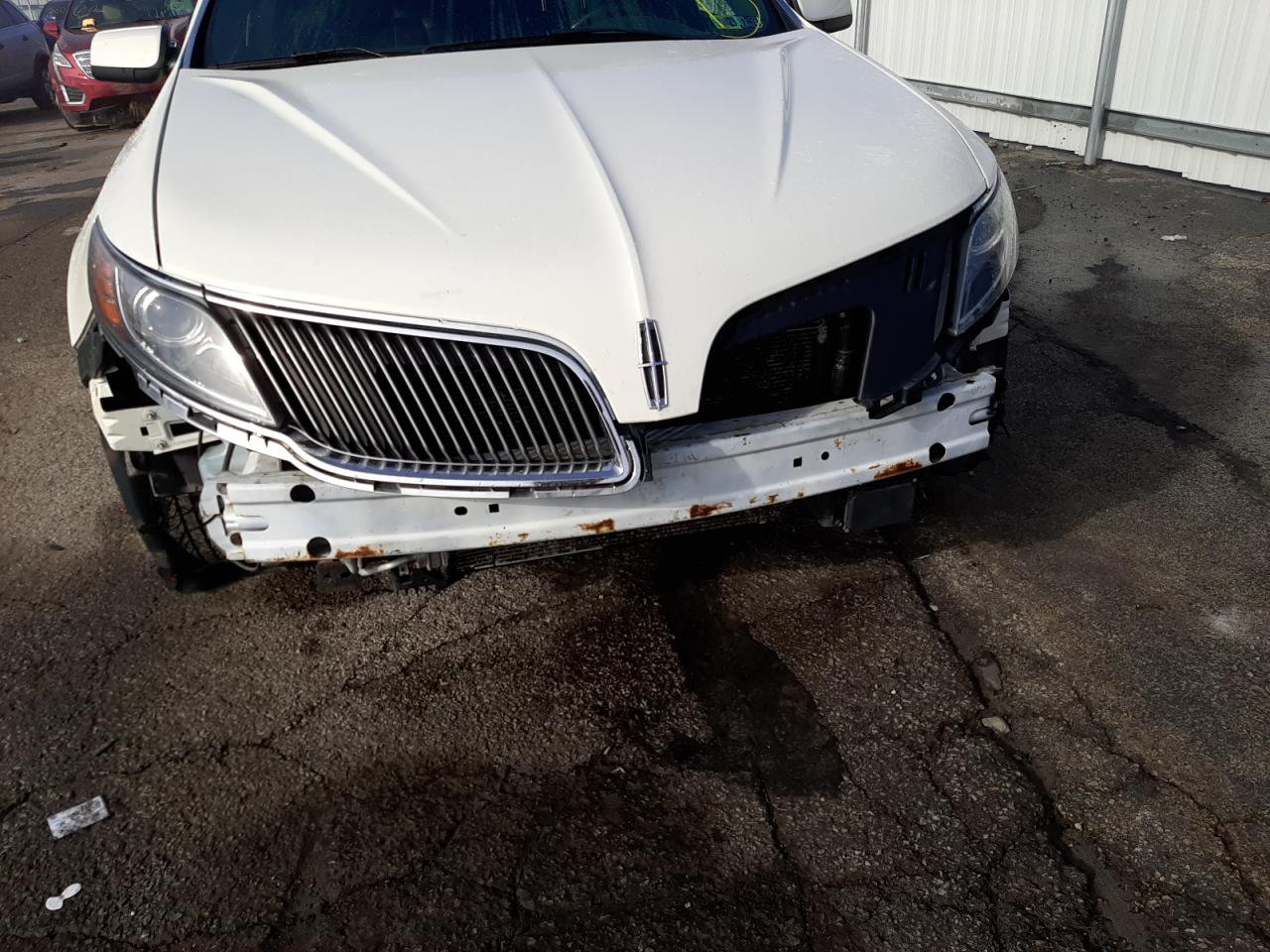 Photo 9 from auction – 2013 LINCOLN MKS with VIN 1LNHL9FT8DG606753