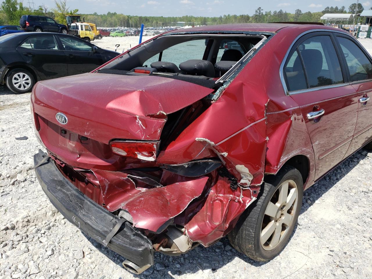 Photo 9 from auction – 2006 KIA OPTIMA LX with VIN KNAGE124665068091
