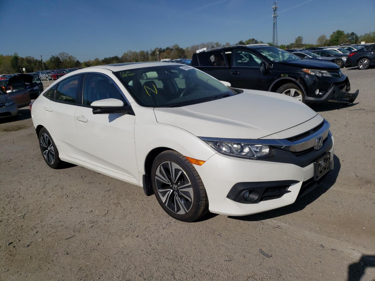 Photo 11 from auction – 2016 HONDA CIVIC EXL with VIN 19XFC1F71GE201564