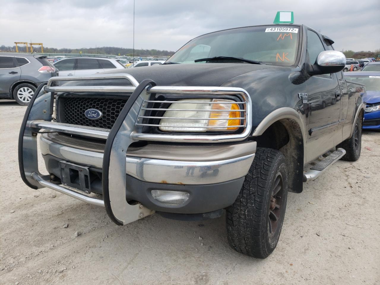 Photo 2 from auction – 2002 FORD F150 with VIN 1FTRX18L72NA76957
