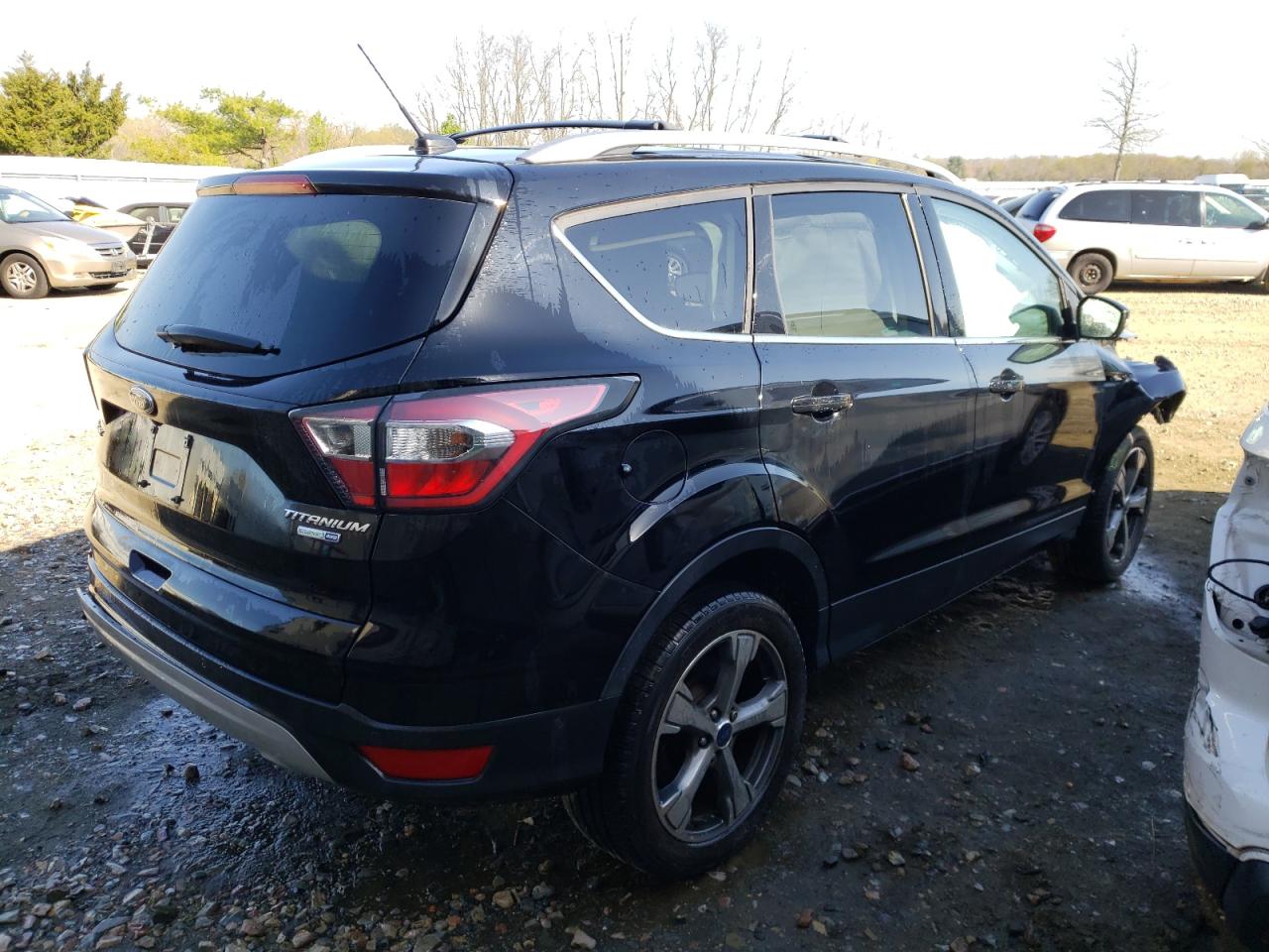 Photo 4 from auction – 2017 FORD ESCAPE TIT with VIN 1FMCU9J94HUA73603