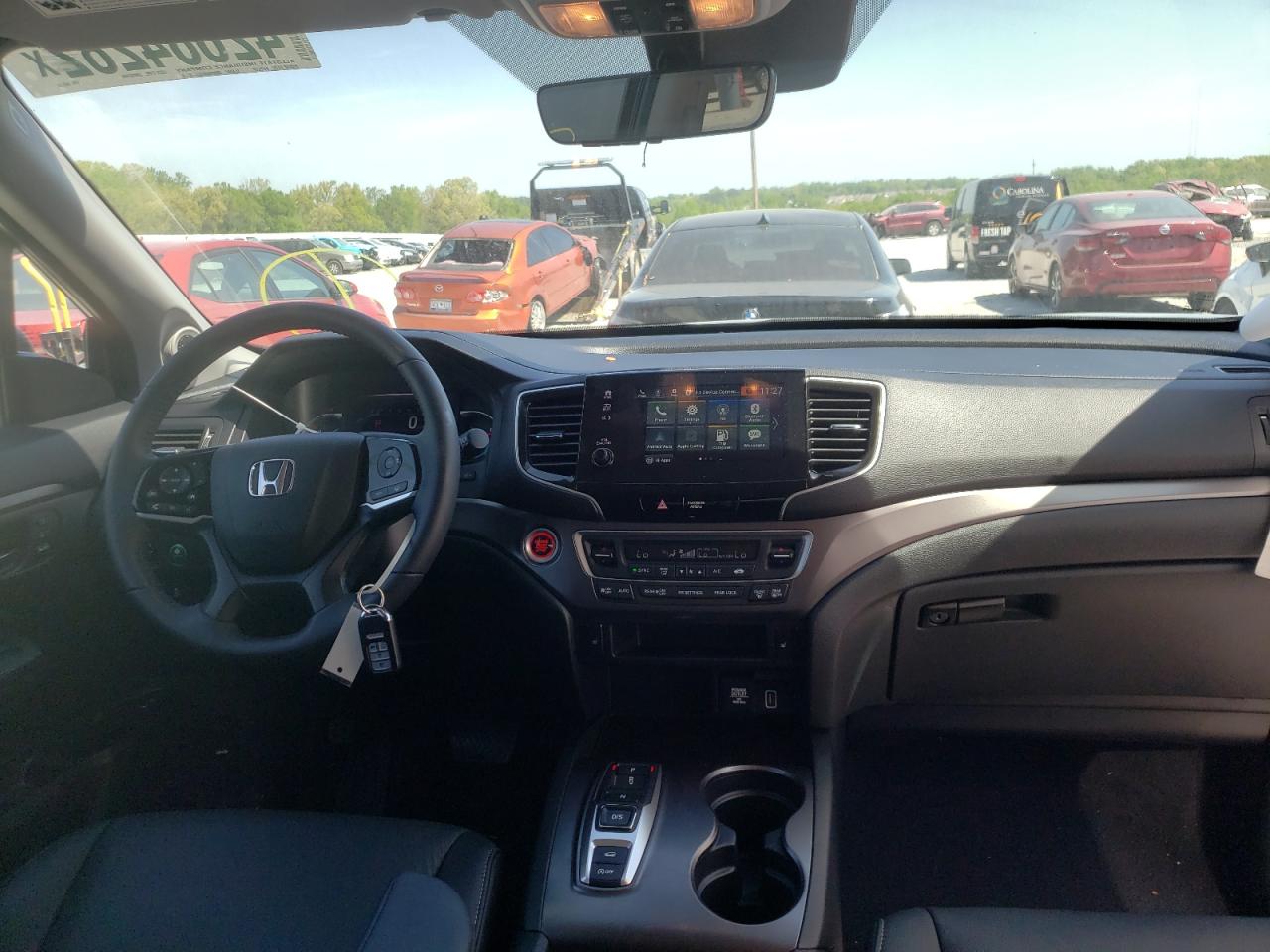 Photo 9 from auction – 2021 HONDA PILOT EXL with VIN 5FNYF6H58MB083754