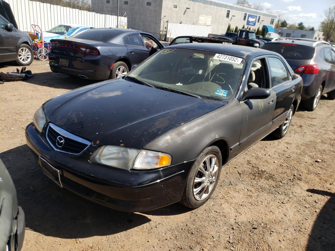 Photo 2 from auction – 2000 MAZDA 626 ES with VIN 1YVGF22C5Y5124192