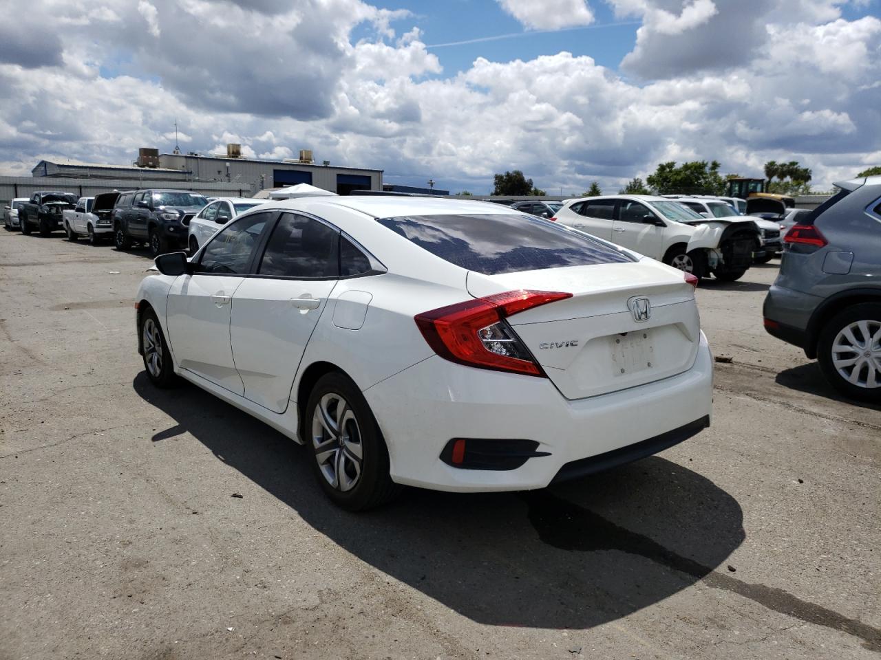 Photo 3 from auction – 2016 HONDA CIVIC LX with VIN 2HGFC2F54GH562152