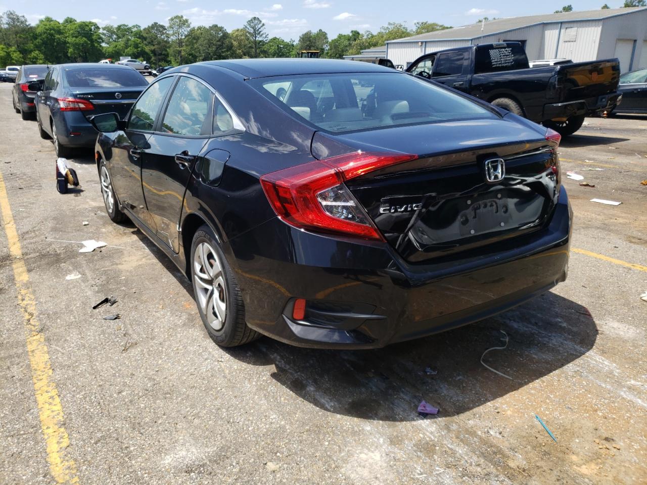 Photo 3 from auction – 2018 HONDA CIVIC LX with VIN 19XFC2F52JE034675