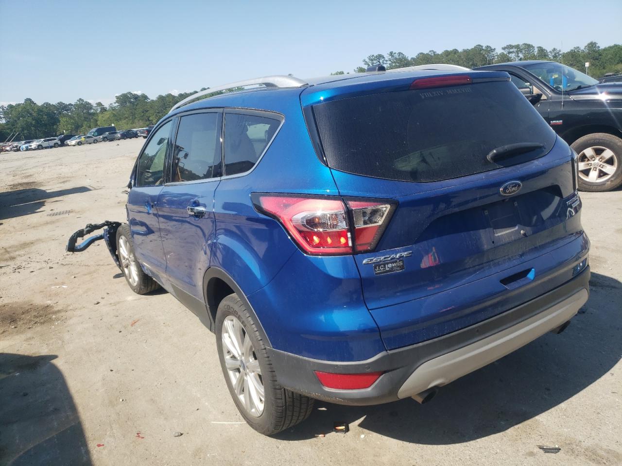 Photo 3 from auction – 2017 FORD ESCAPE TIT with VIN 1FMCU0J98HUC86131