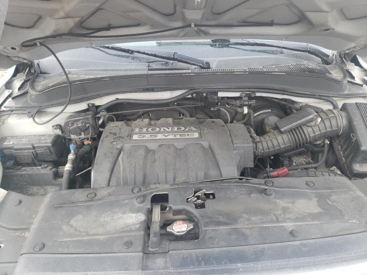 Photo 7 from auction – 2006 HONDA PILOT LX with VIN 2HKYF18156H520890