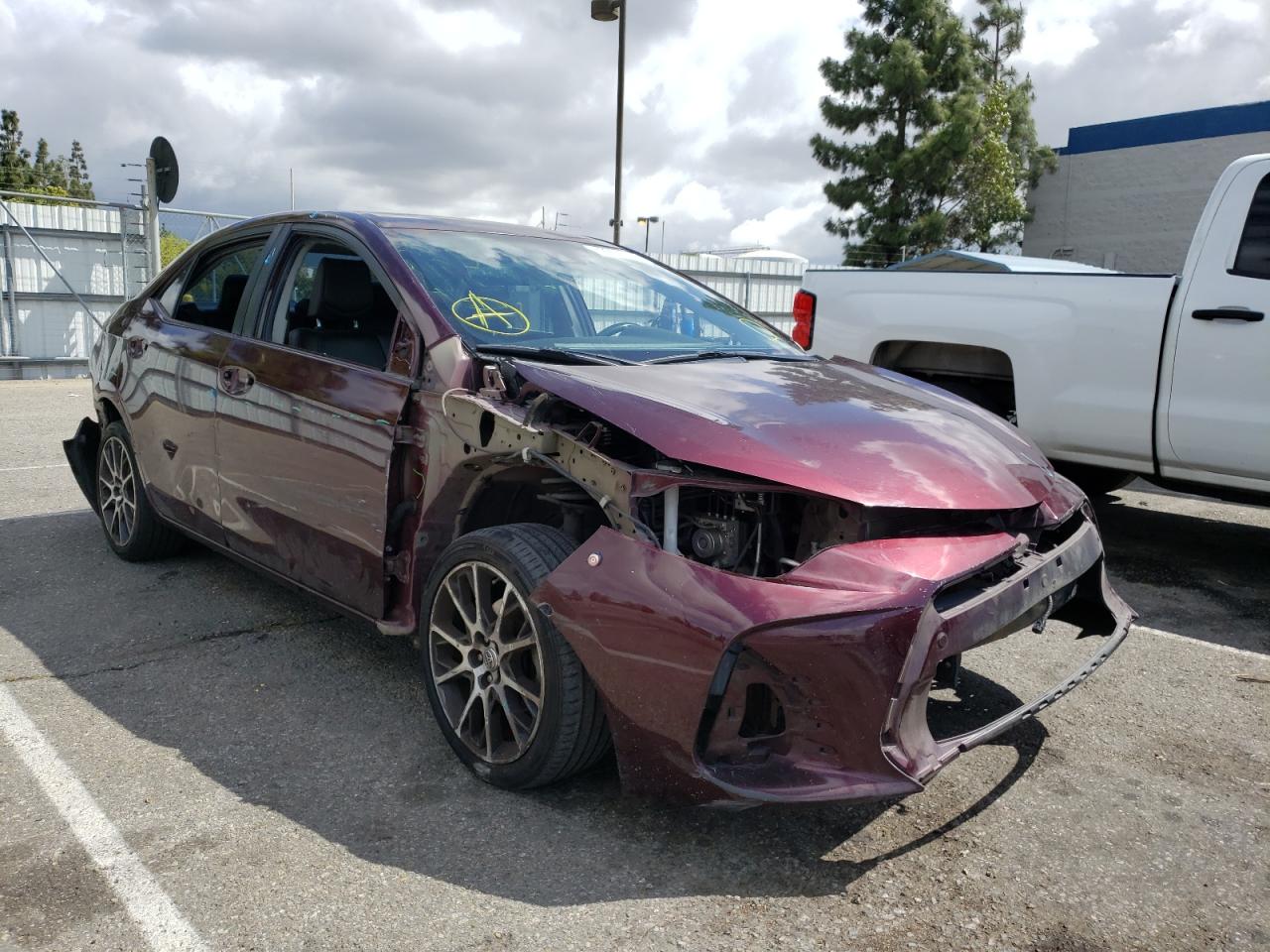 TOYOTA COROLLA L 2017 with VIN 5YFBURHE6HP597092 - Photo from auction