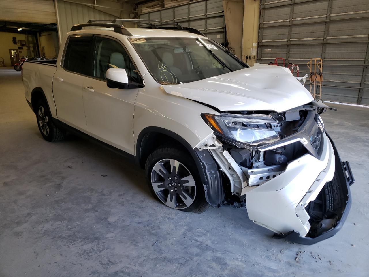 HONDA RIDGELINE 2017 with VIN 5FPYK3F66HB016234 - Photo from auction