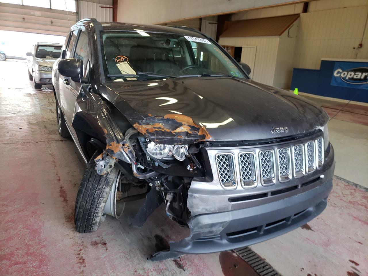 Photo 9 from auction – 2015 JEEP COMPASS LA with VIN 1C4NJDEB0FD307769