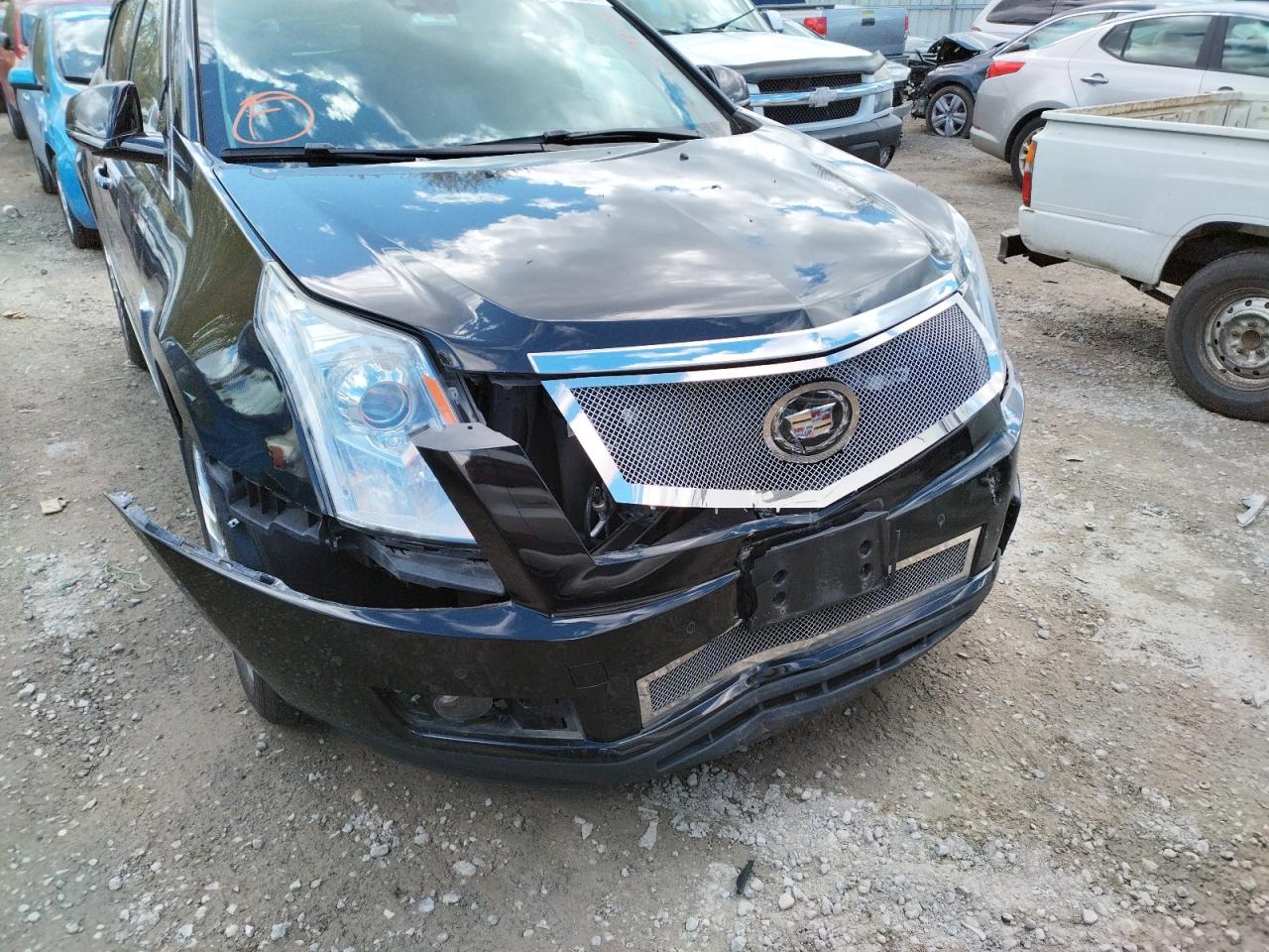 Photo 9 from auction – 2016 CADILLAC SRX PREMIU with VIN 3GYFNDE30GS572673