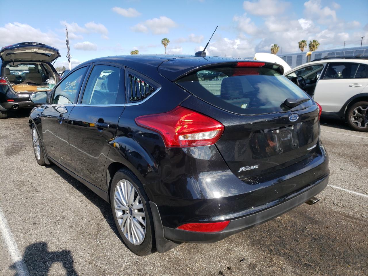 Photo 3 from auction – 2015 FORD FOCUS TITA with VIN 1FADP3N24FL357929