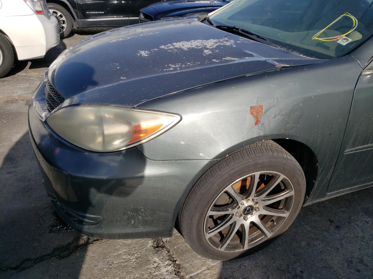 Photo 9 from auction – 2004 TOYOTA CAMRY LE with VIN 4T1BE32KX4U356816