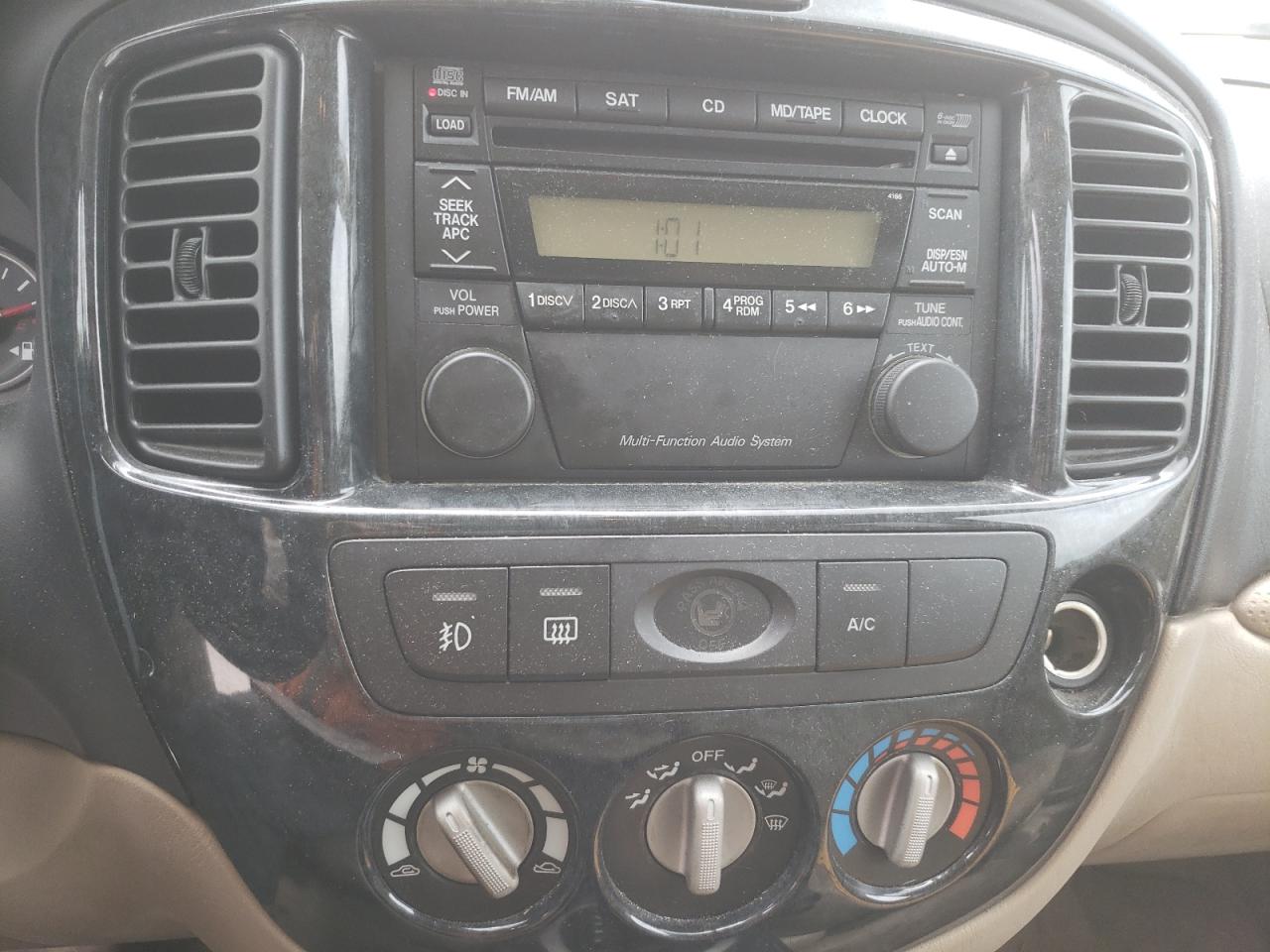Photo 9 from auction – 2006 MAZDA TRIBUTE S with VIN 4F2CZ06146KM32882