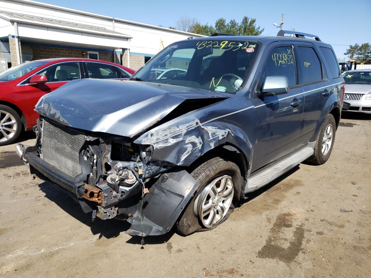 Photo 2 from auction – 2011 FORD ESCAPE LIM with VIN 1FMCU9EG2BKA78116