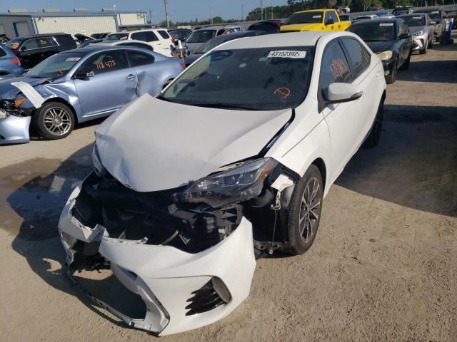 Photo 2 from auction – 2018 TOYOTA COROLLA L with VIN 5YFBURHE7JP814168
