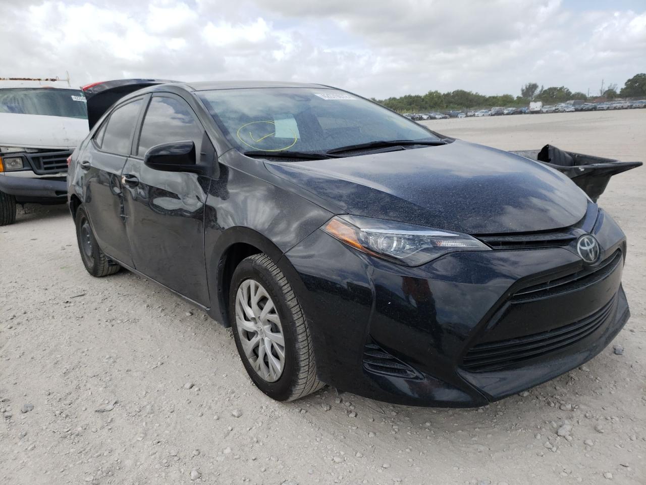 TOYOTA COROLLA L 2018 with VIN 5YFBURHE9JP839220 - Photo from auction