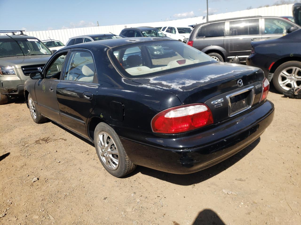Photo 3 from auction – 2000 MAZDA 626 ES with VIN 1YVGF22C5Y5124192