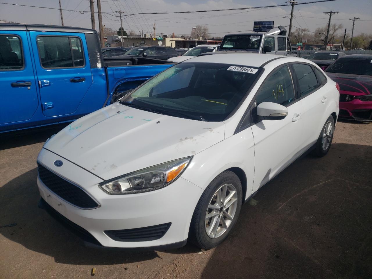 Photo 2 from auction – 2016 FORD FOCUS SE with VIN 1FADP3F21GL336620