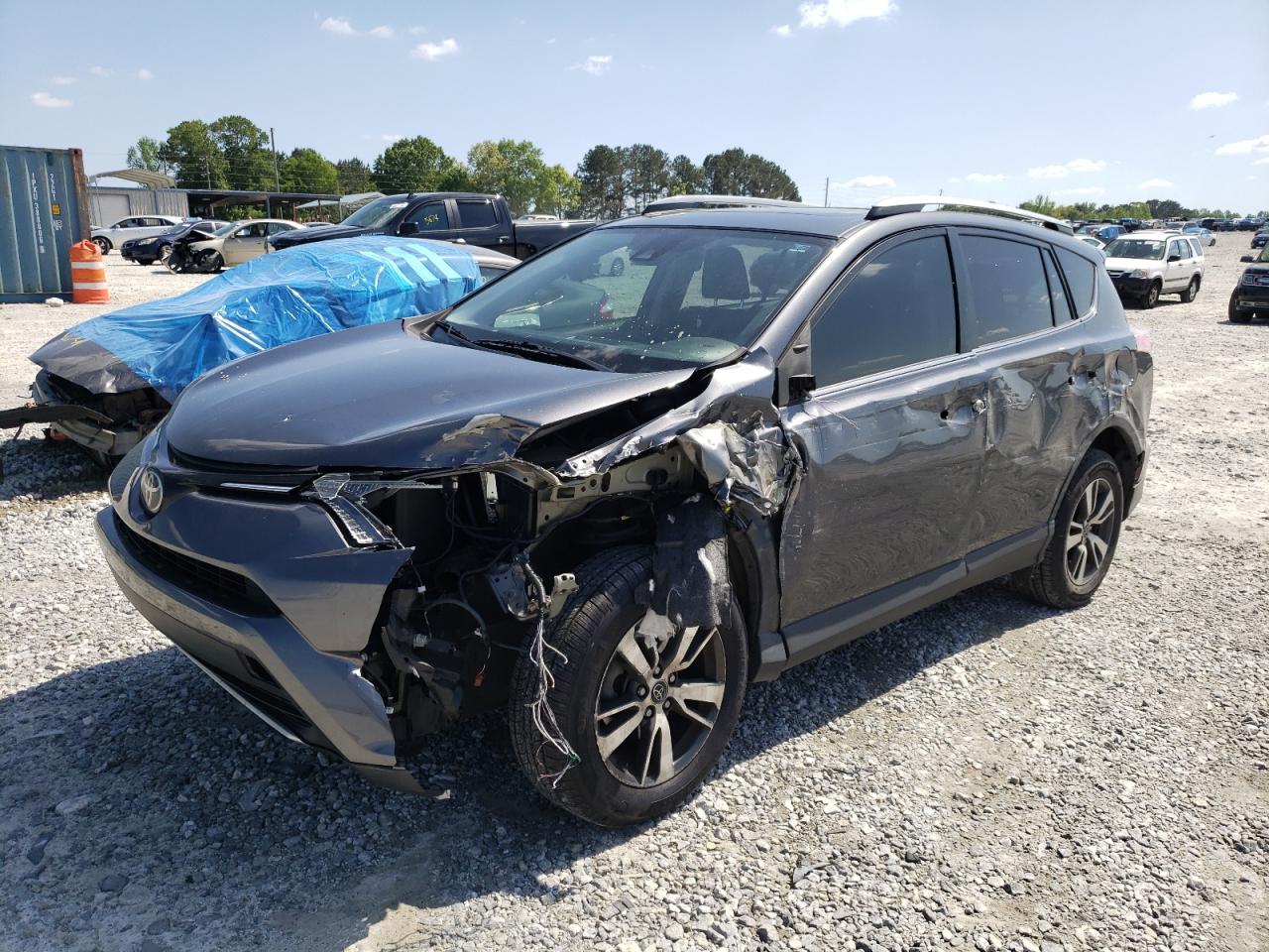 Photo 2 from auction – 2017 TOYOTA RAV4 XLE with VIN JTMWFREV8HD104001