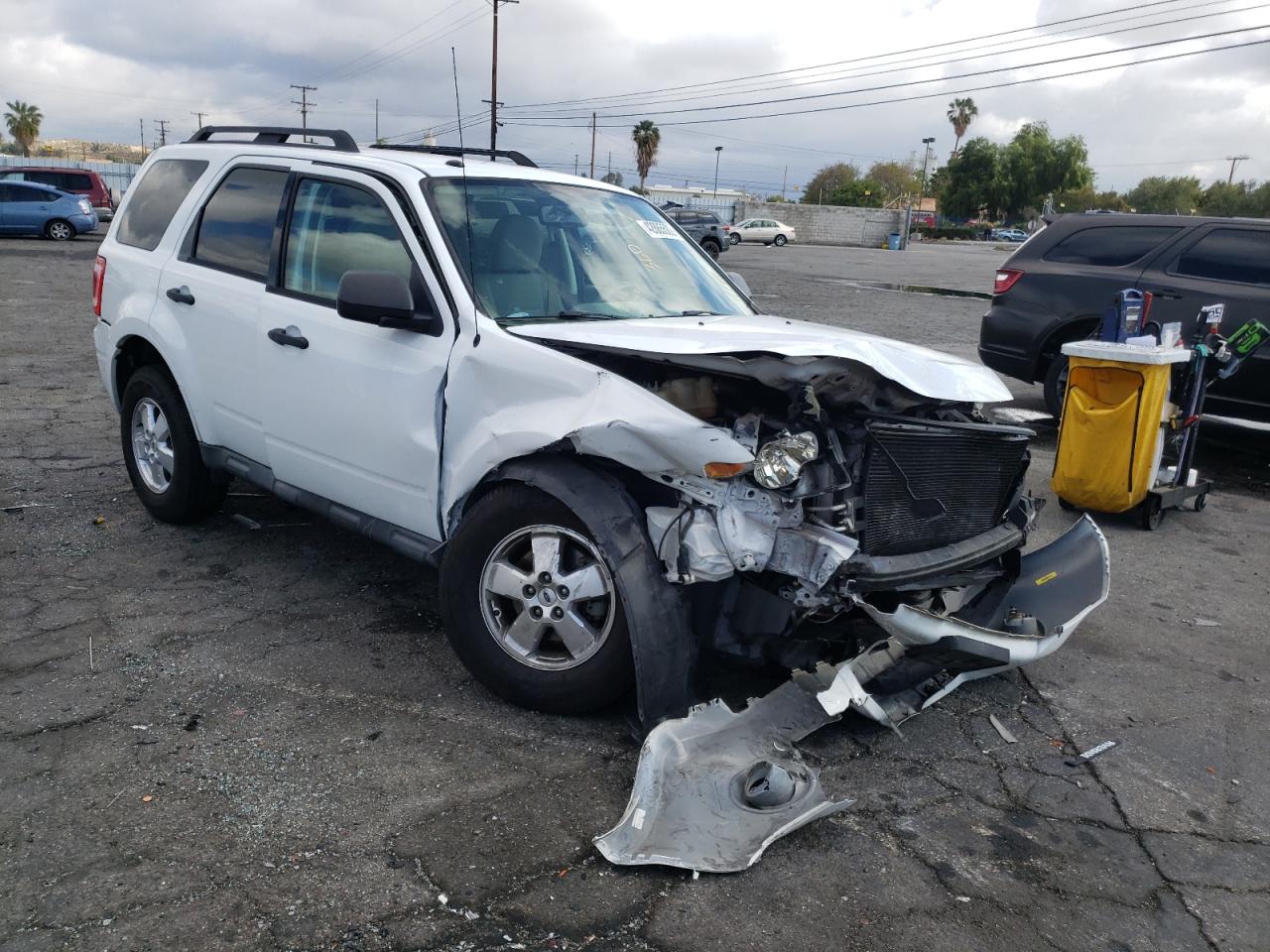 FORD ESCAPE XLT 2011 with VIN 1FMCU0DG8BKA15289 - Photo from auction