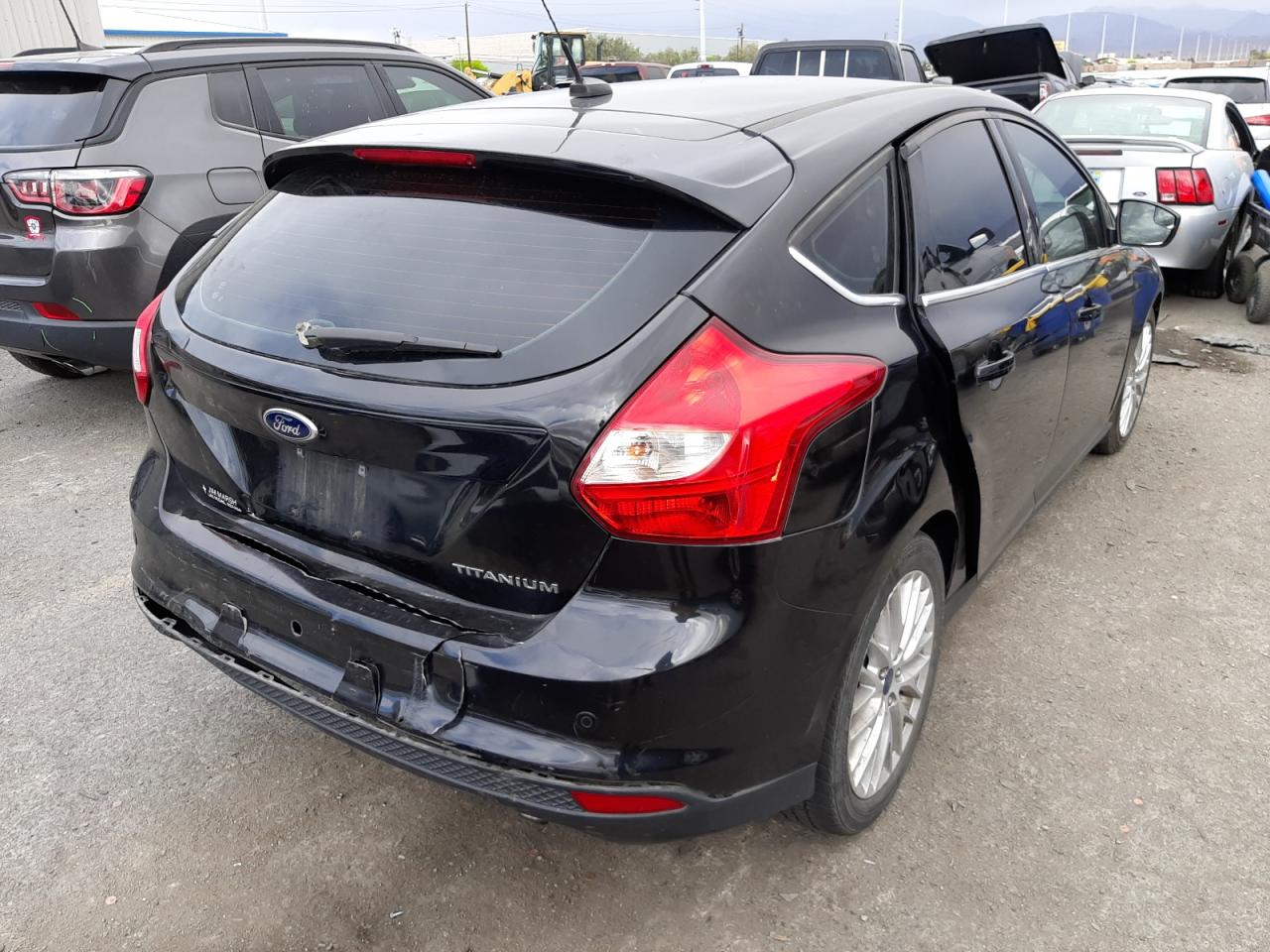 Photo 4 from auction – 2014 FORD FOCUS TITA with VIN 1FADP3N23EL423191