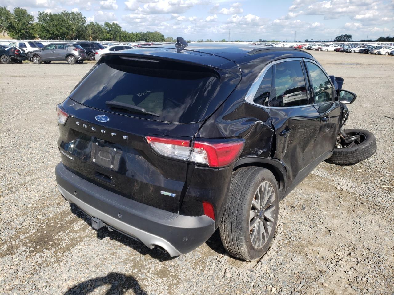 Photo 4 from auction – 2020 FORD ESCAPE TIT with VIN 1FMCU9J94LUB19892