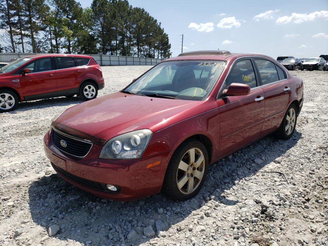 Photo 2 from auction – 2006 KIA OPTIMA LX with VIN KNAGE124665068091