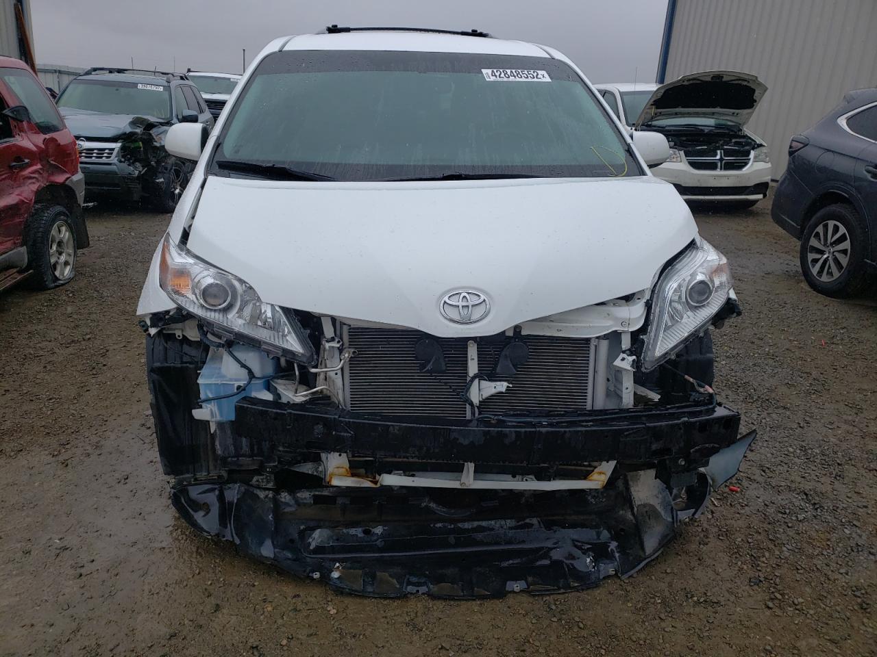 Photo 9 from auction – 2015 TOYOTA SIENNA LE with VIN 5TDKK3DC9FS598779