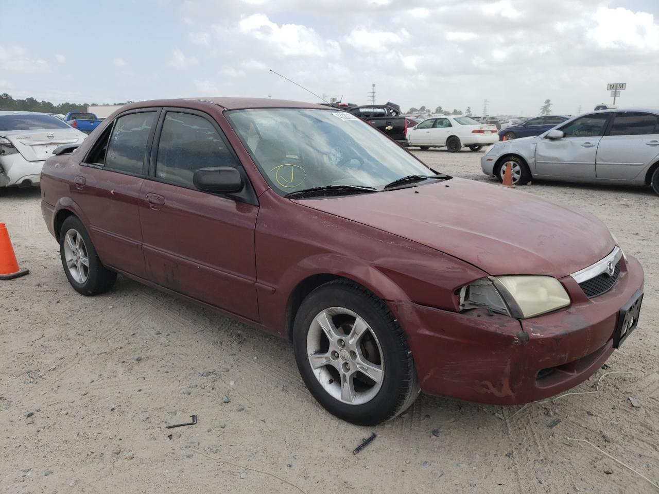 MAZDA PROTEGE ES 1999 with VIN JM1BJ2220X0118107 - Photo from auction