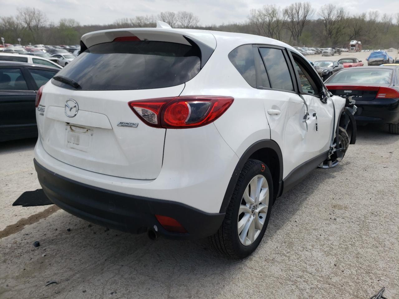 Photo 4 from auction – 2014 MAZDA CX-5 GT with VIN JM3KE4DYXE0323424